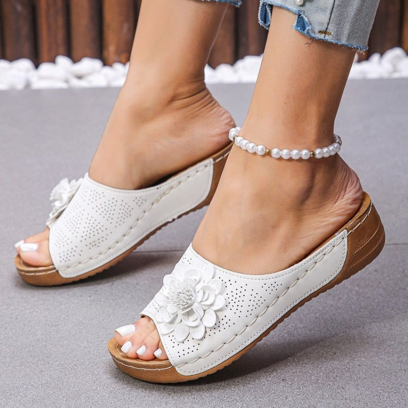 Thea | Flower Appliqué Perforated Slip On Wedge Sandals