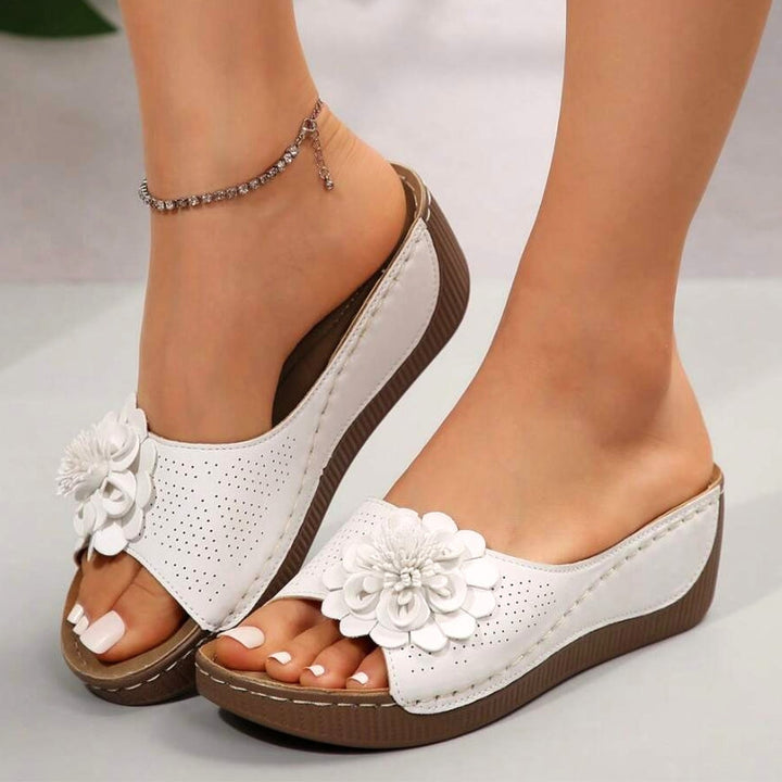 Thea | Flower Appliqué Perforated Slip On Wedge Sandals