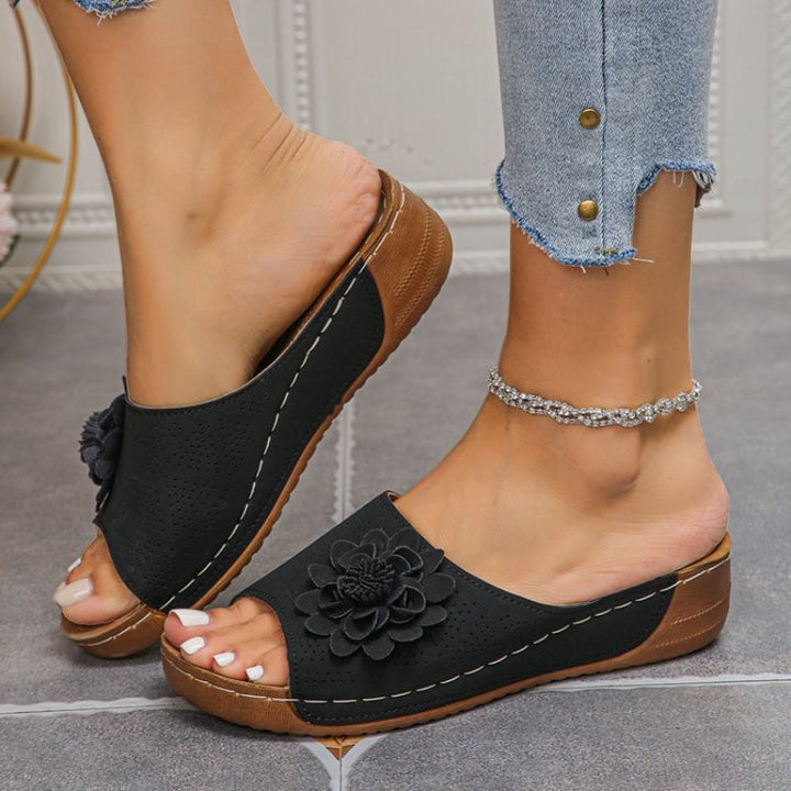 Thea | Flower Appliqué Perforated Slip On Wedge Sandals